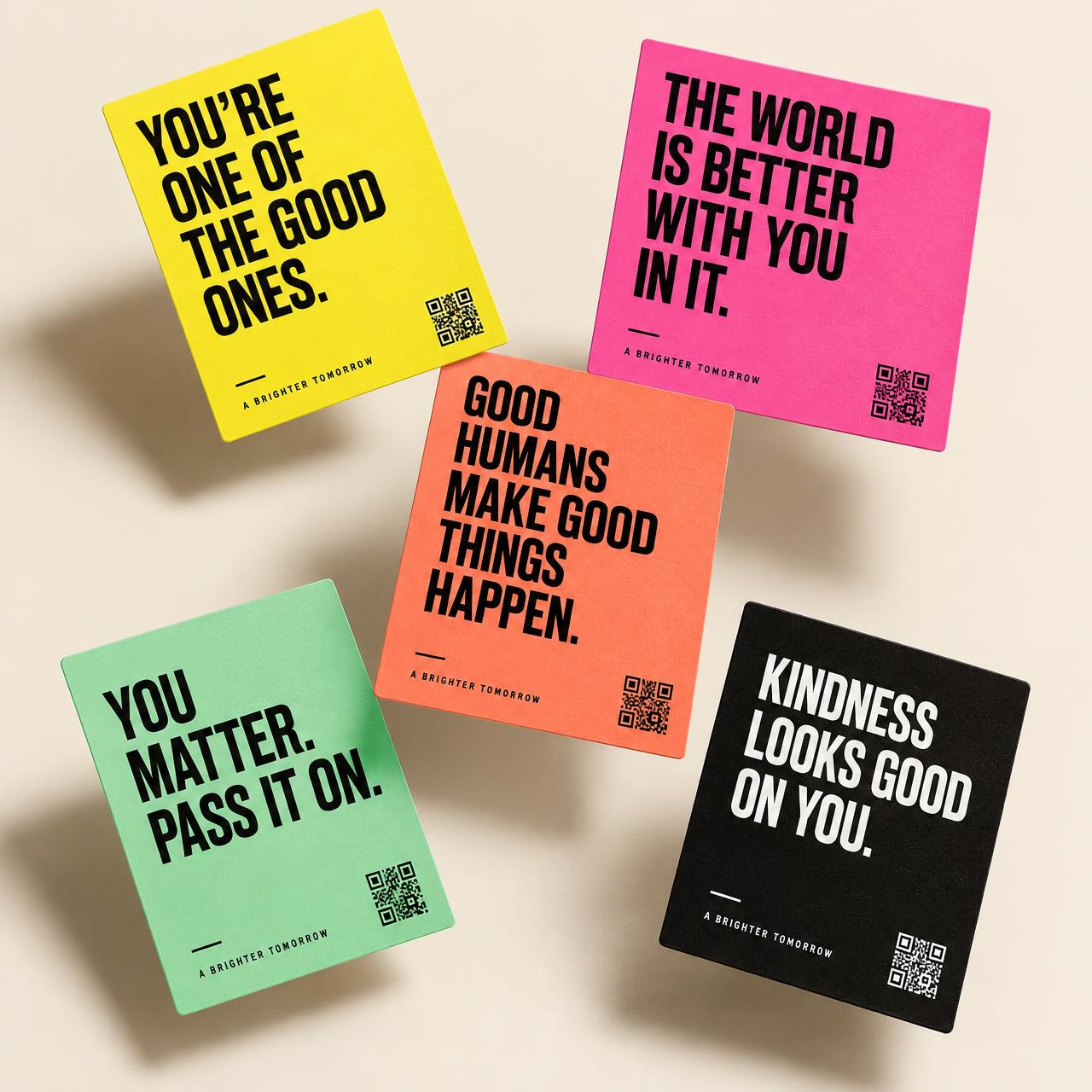 Five colorful kindness cards with messages like You're one of the good ones